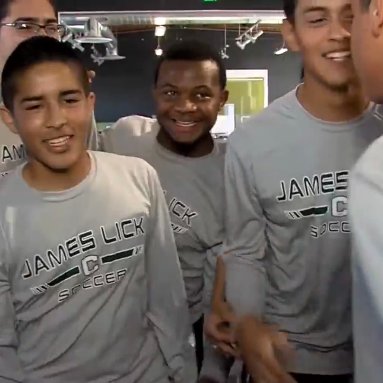 Group of James Lick High School soccer players in gray team shirts backstage during a Cal-Hi Sports TV segment.